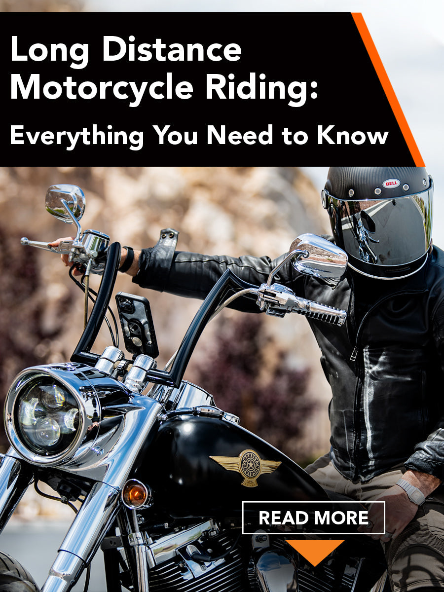Man on black cruiser motorcycle with ROKFORM phone handlebar mount