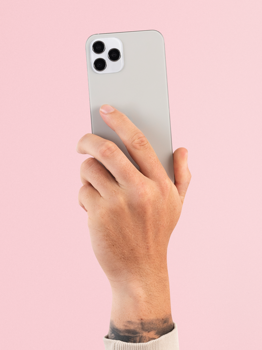 Person holding iPhone wondering when should you upgrade your phone based on performance and battery life