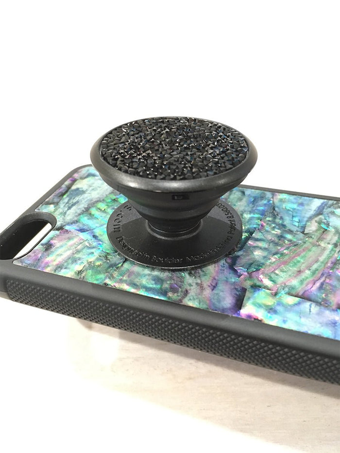 Pop socket alternatives tend to last longer and offer better strength than the sticky-grippy adhesives of the past. Link: https://commons.wikimedia.org/wiki/File:Swarovski_crystal_PopSockets_grip_.jpg