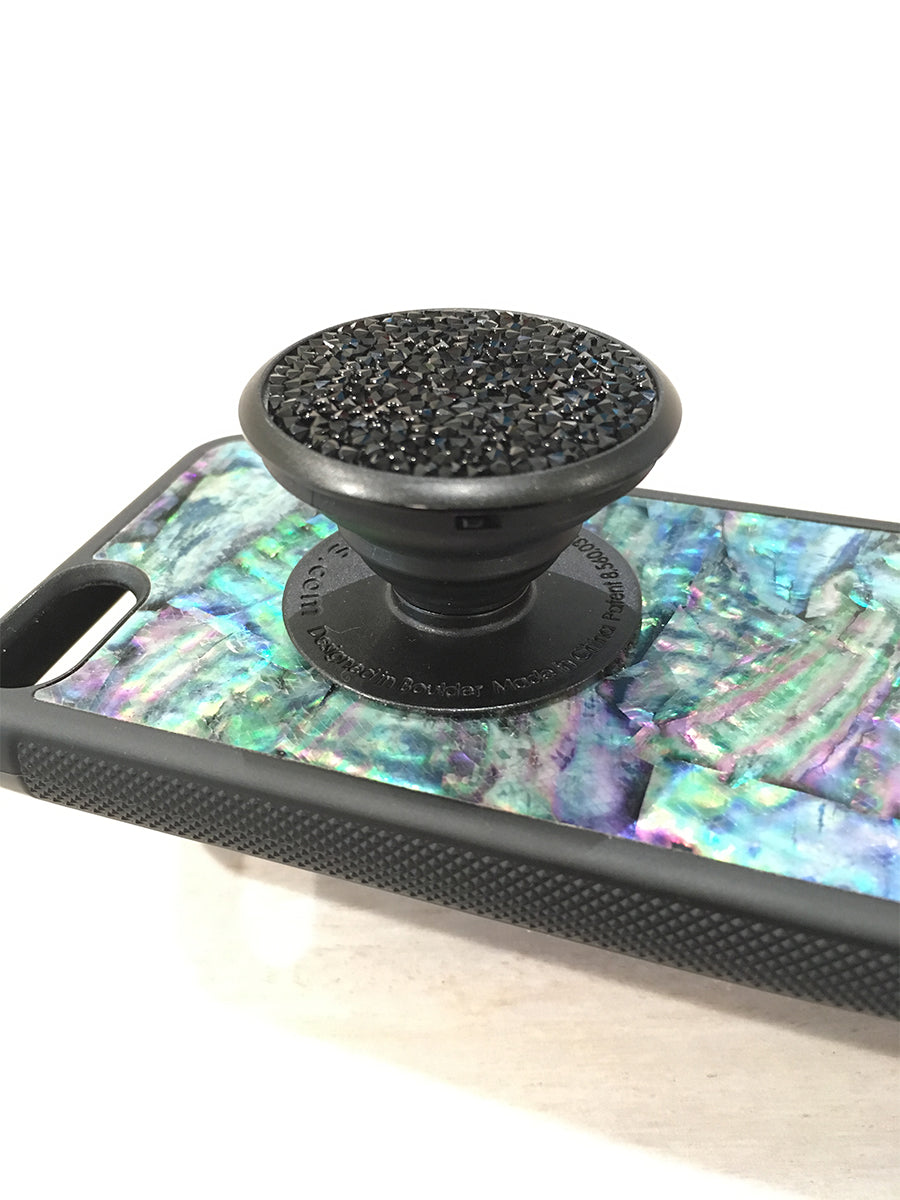Pop socket alternatives tend to last longer and offer better strength than the sticky-grippy adhesives of the past. Link: https://commons.wikimedia.org/wiki/File:Swarovski_crystal_PopSockets_grip_.jpg