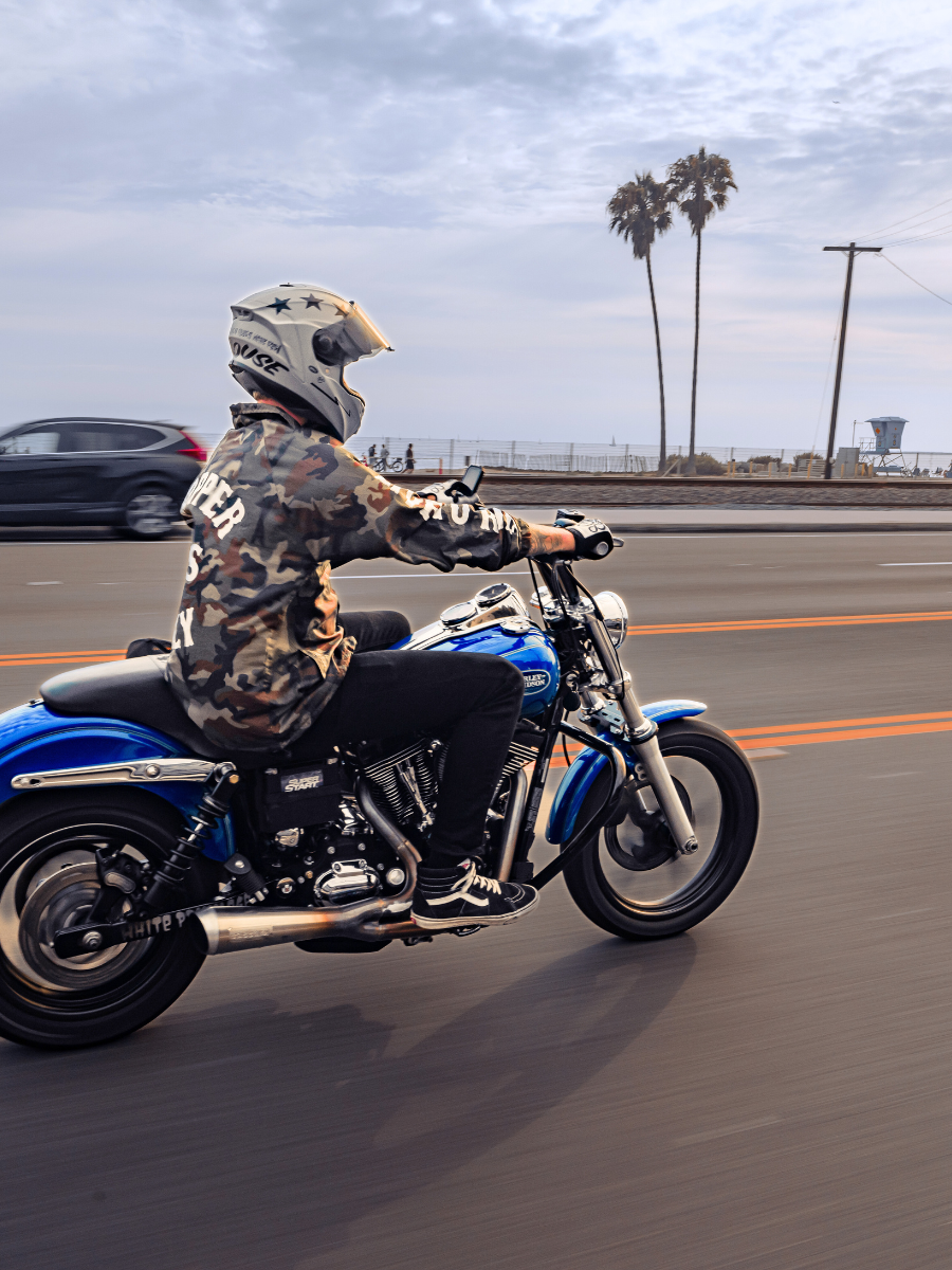 Man riding motorcycle on PCH