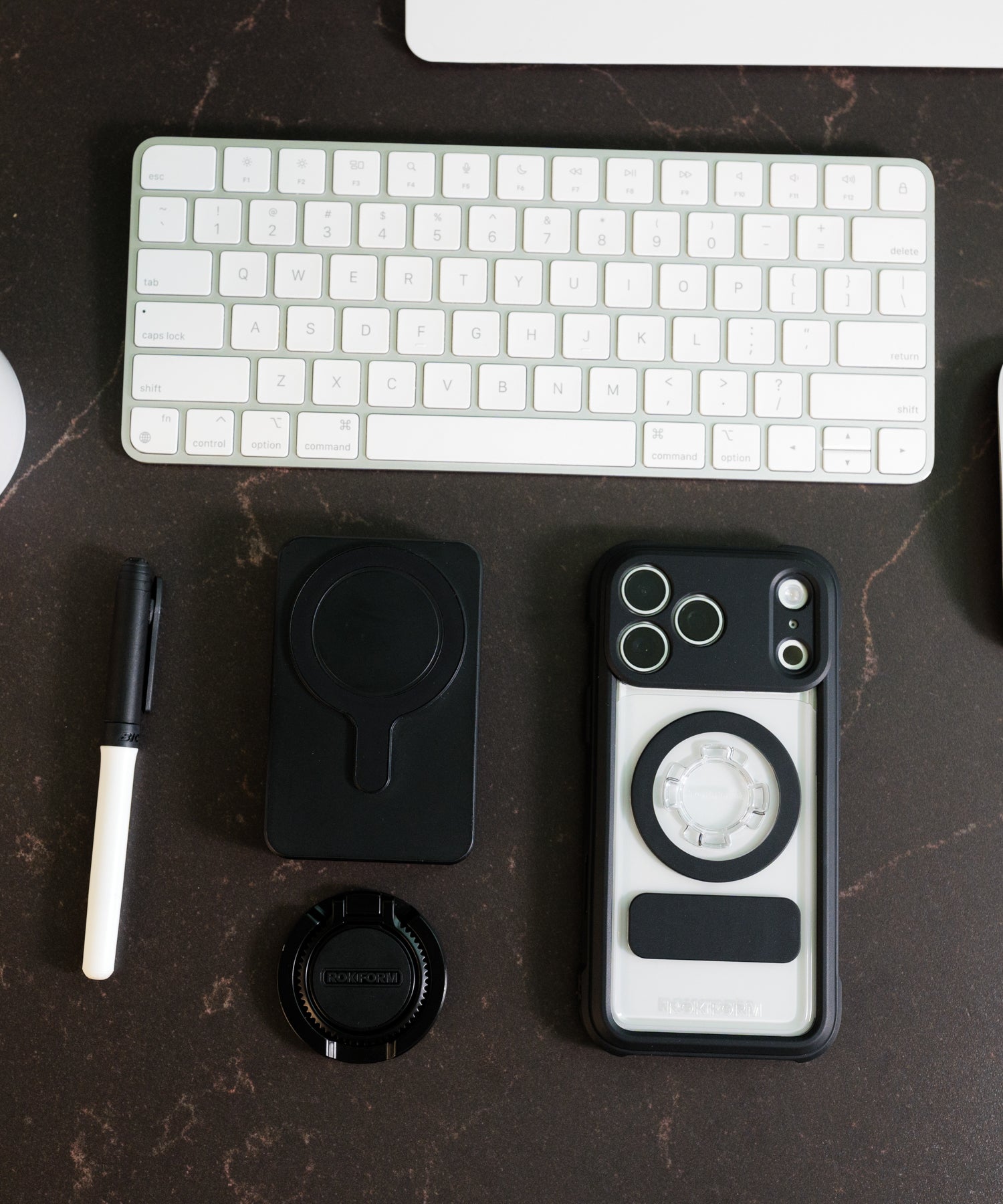iPhone in a Rokform Crystal Case on a desk in an office setting