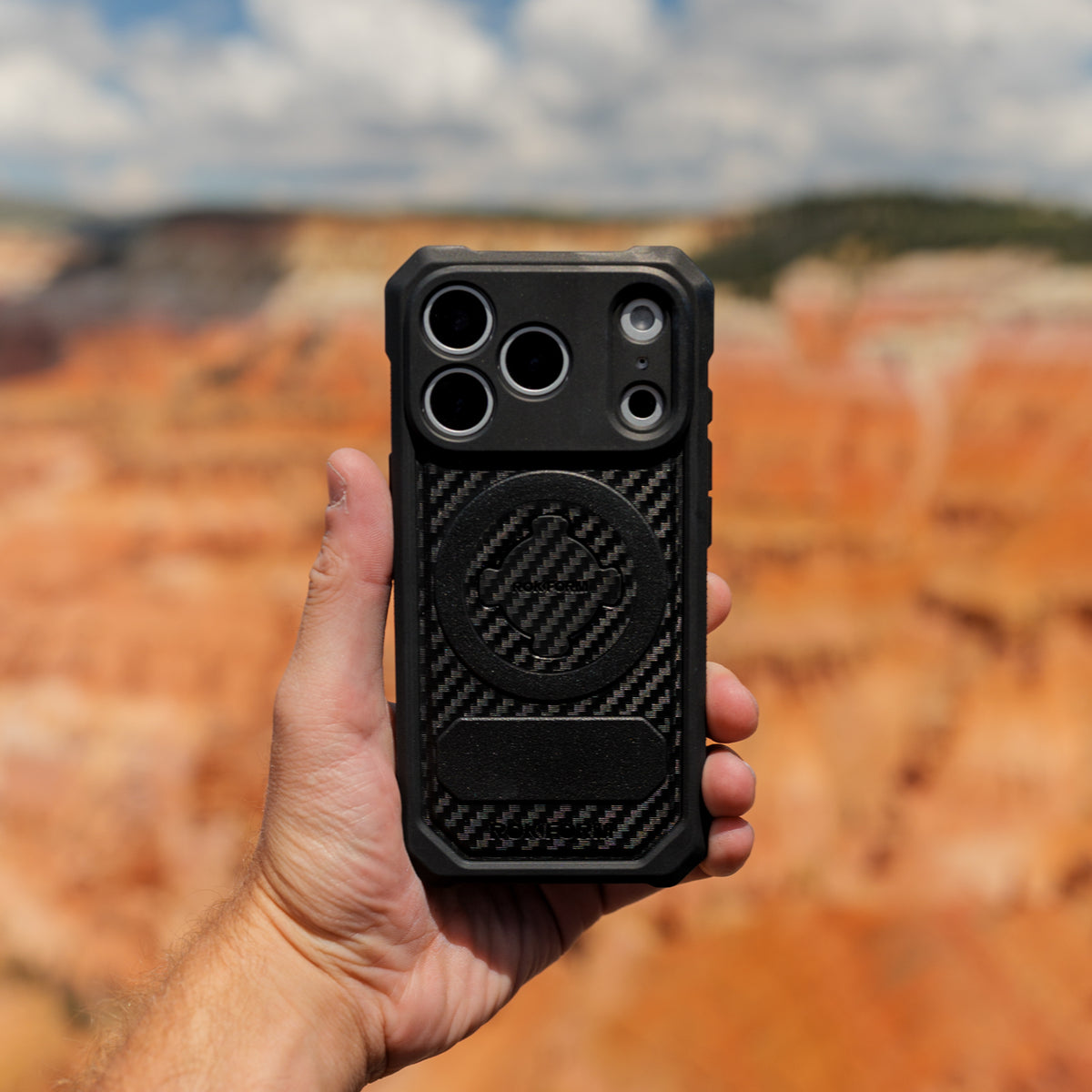 Rokform Rugged Case held outdoors against a Utah desert landscape